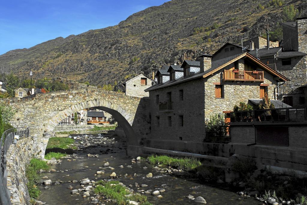 Medieval bridge over the Noguera Pallaresa river in the village of Esterri de Anau