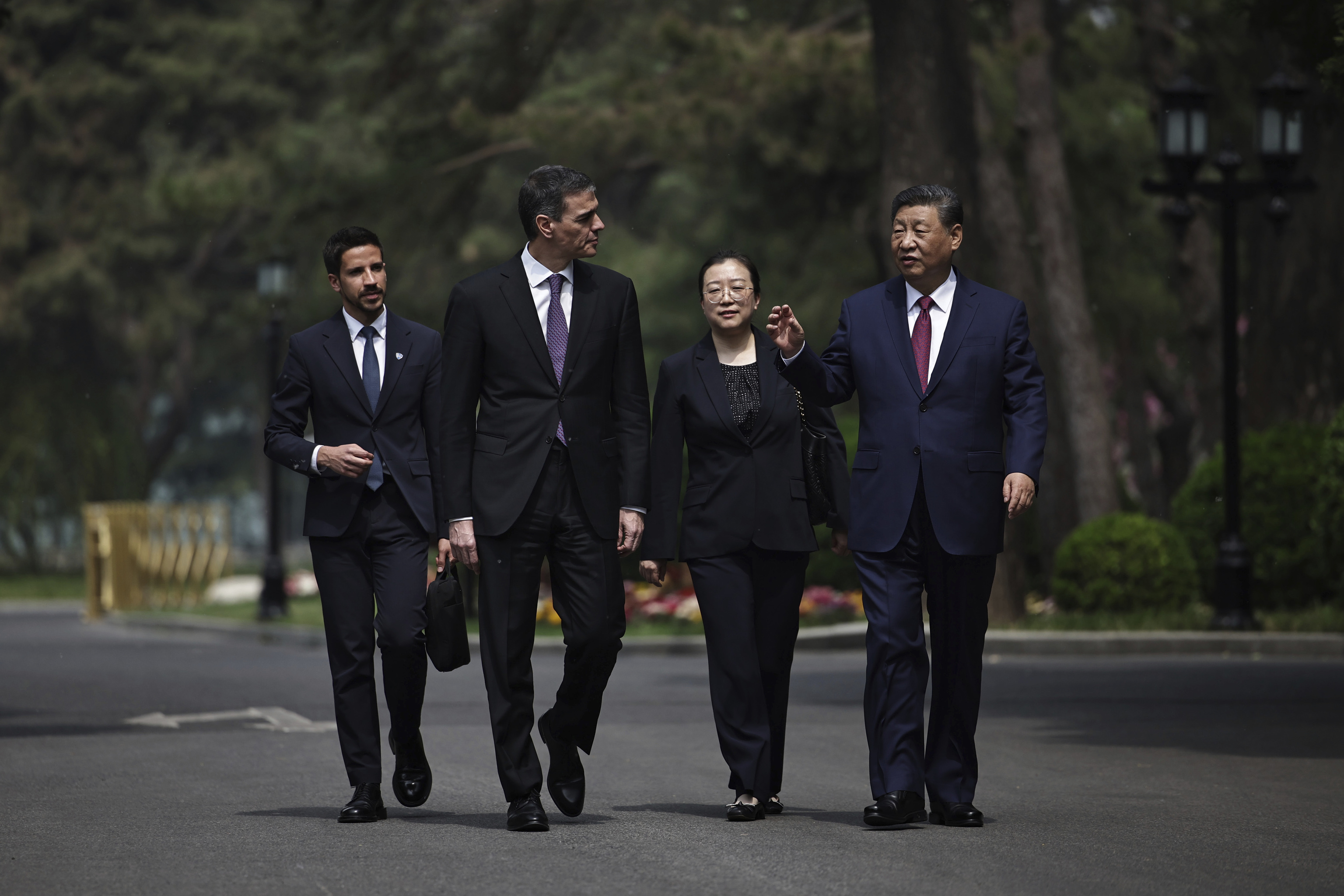 Chinese President Xi Jinping, right and Spanish Prime Minister Pedro Sanchez, second left.