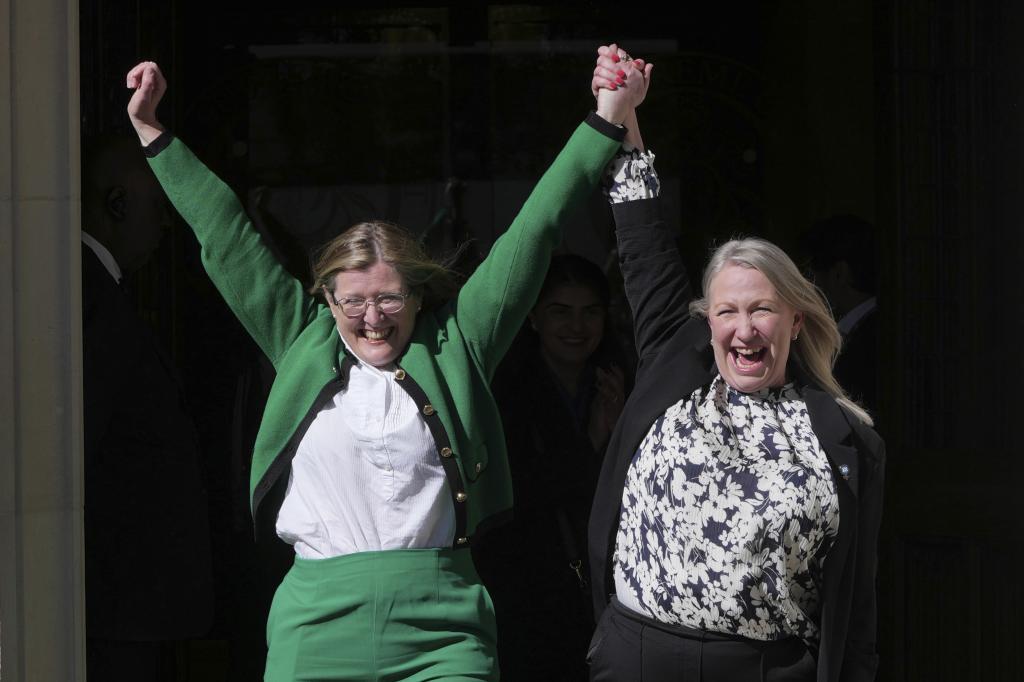Marion Calder and Susan Smith from For Women Scotland, celebrate outside the Supreme Court to challenge gender recognition laws