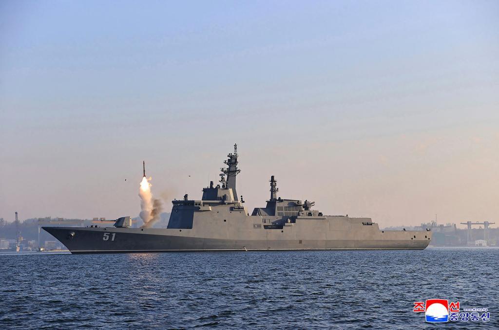 Missiles from a newly launched destroyer " Choe Hyon " at an undisclosed place in North Korea