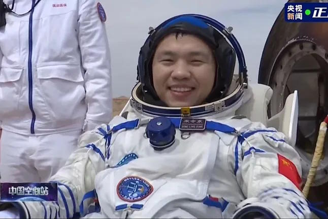 One of the three astronauts who have returned to Earth.
