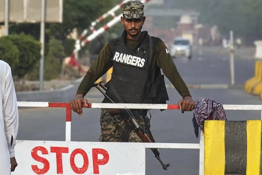 A Pakistani soldier stands guard at a post in Wagah, bordering India.