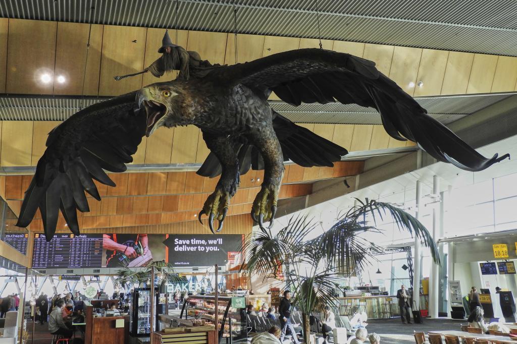 A sculpture of an eagle from the Hobbit films, ridden by the wizard Gandalf, hangs over the food court area of Wellington Airport,