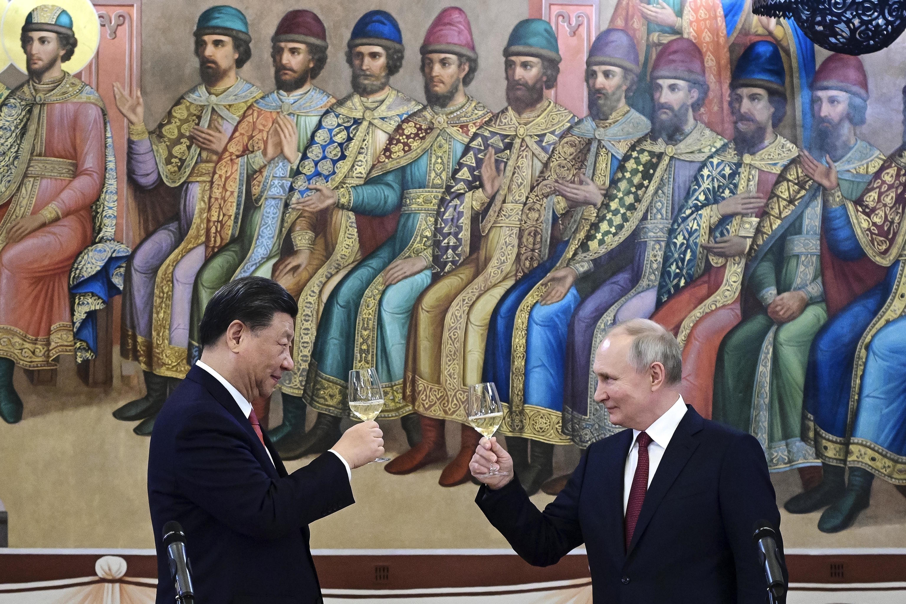 Xi Jinping and Vladimir Putin during a dinner in Moscow in March 2023.