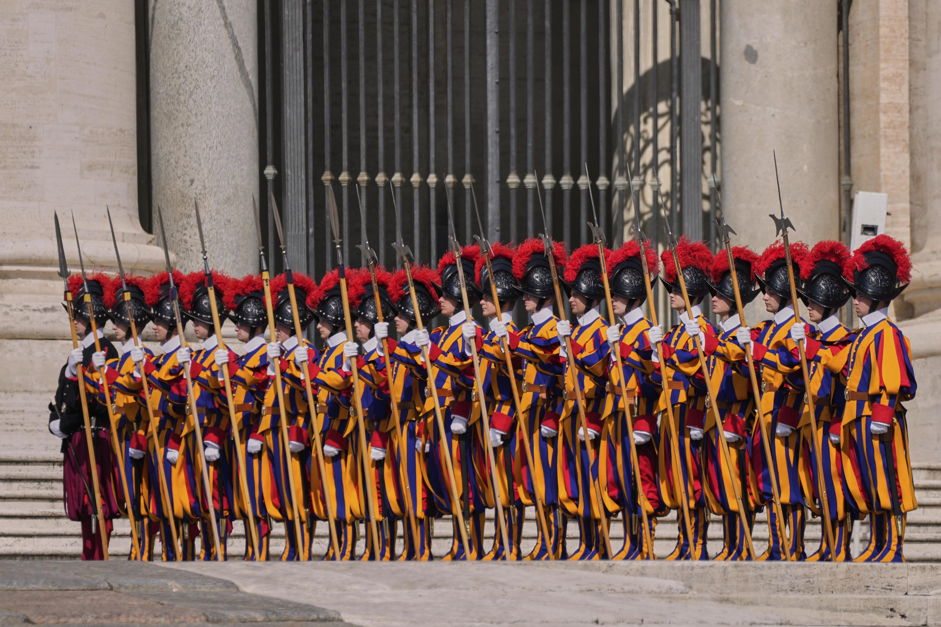 Pontifical Swiss Guards in formation in St. Peter's Square, while awaiting the arrival of Pope Francis' body at St. Peter's.
