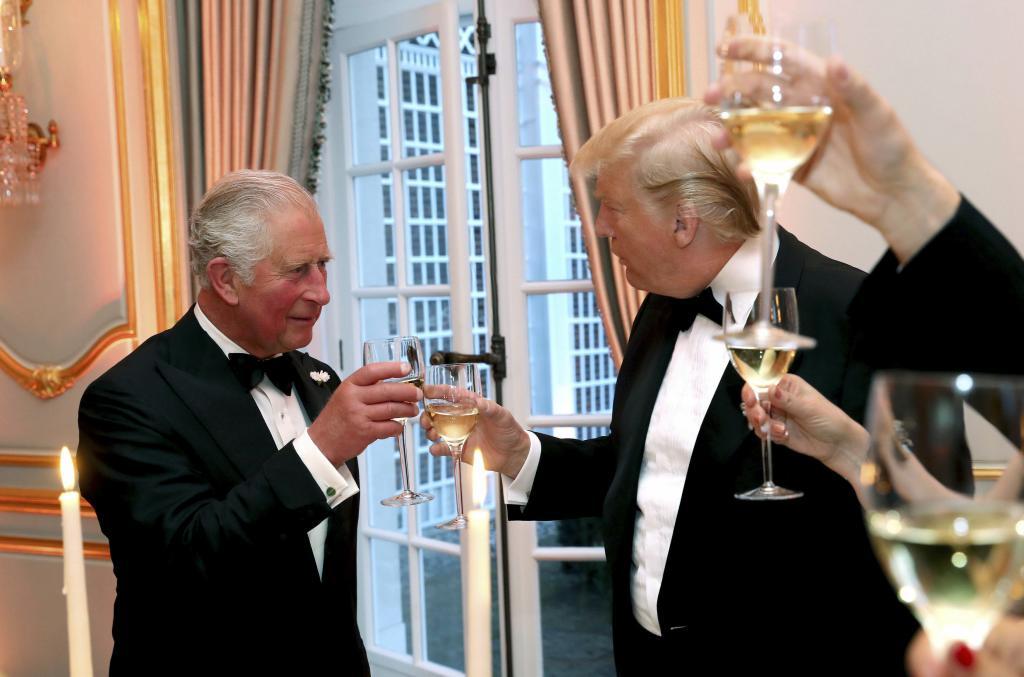 U.S. President Donald Trump and Britain's Prince Charles toast, during the Return Dinner in Winfield House