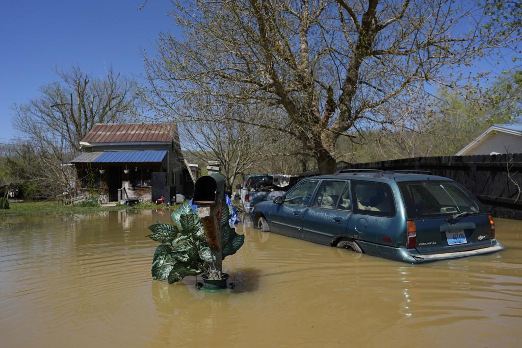 A home is flooded by the Kentucky River, Lockport, Ky