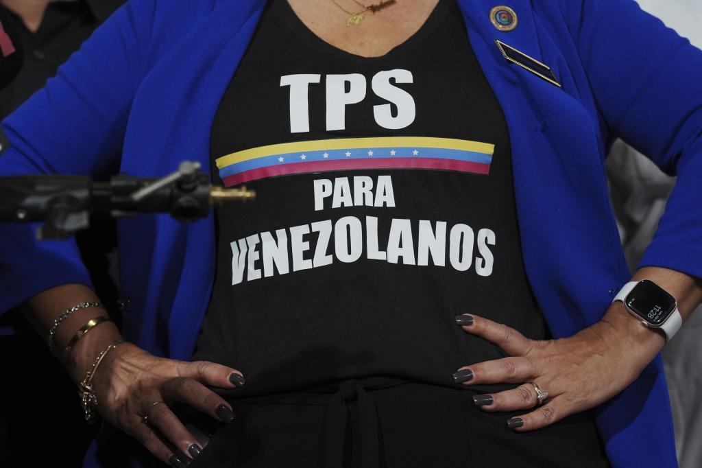 Activist Helene Villalonga wears a tee-shirt calling for Temporary Protected Status for Venezuelans