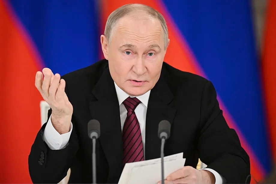 Putin addresses journalists from the Grand Kremlin Palace in Moscow.