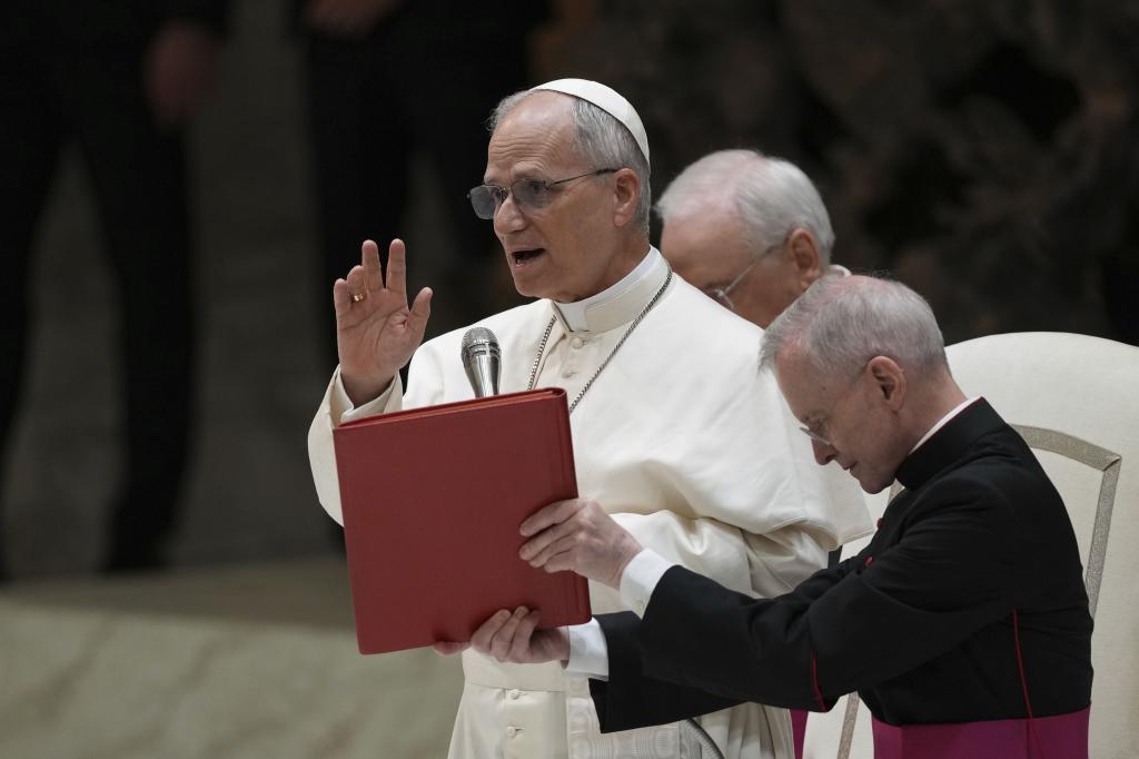 Pope Leo XIV meets members of the international media in the Paul VI Hall at the Vatican