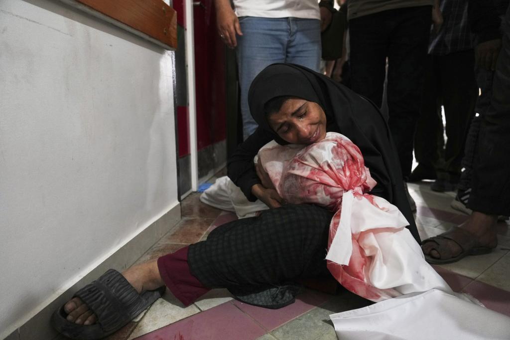 A Palestinian woman mourns her son, killed in an Israeli airstrikes in Jabalia