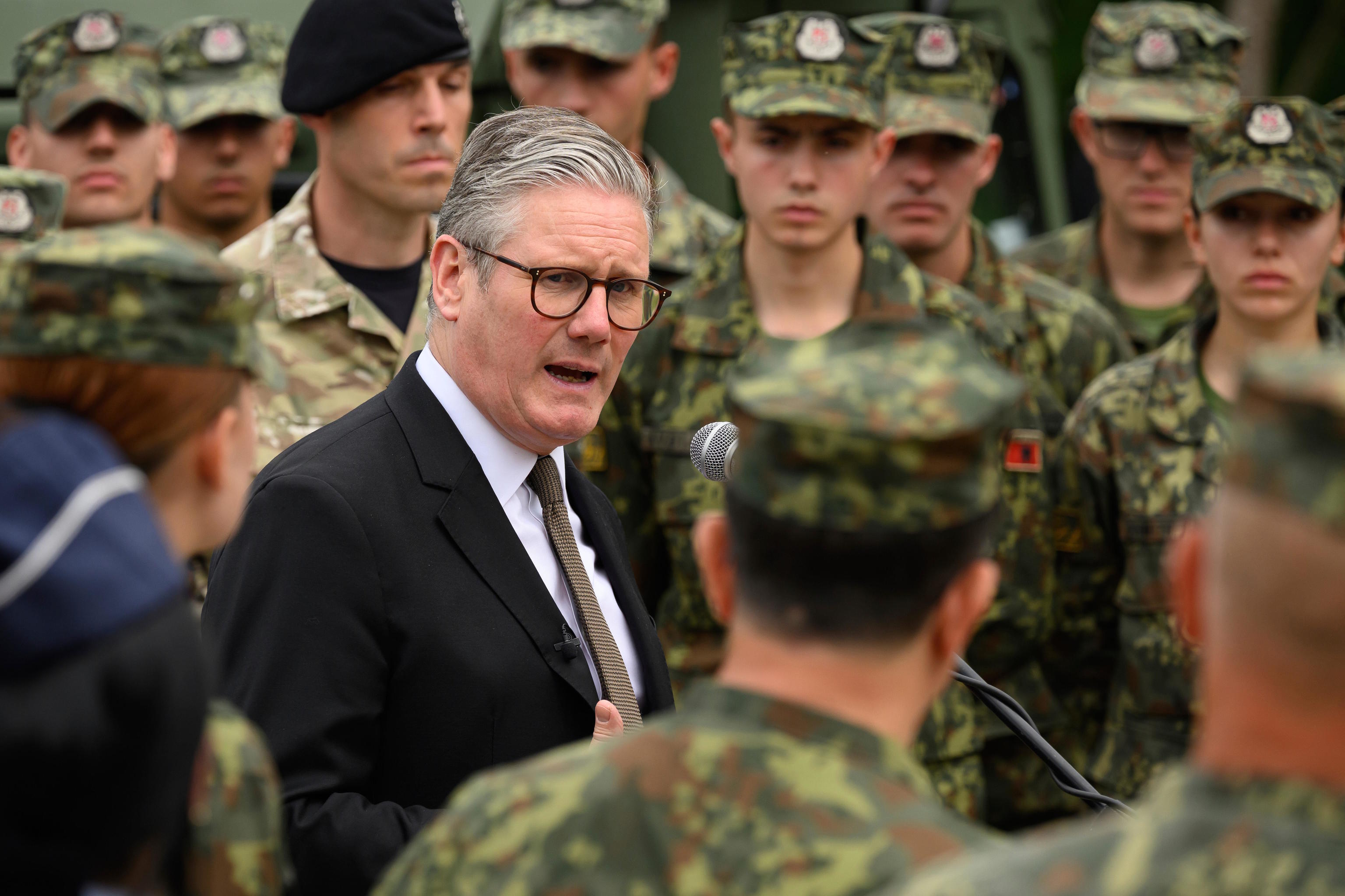 Britain's Prime Minister Keir Starmer speaks to British and Albanian troops.