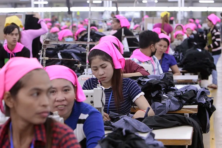 Several female workers during a workday at a textile factory in Phnom Penh, Cambodia.