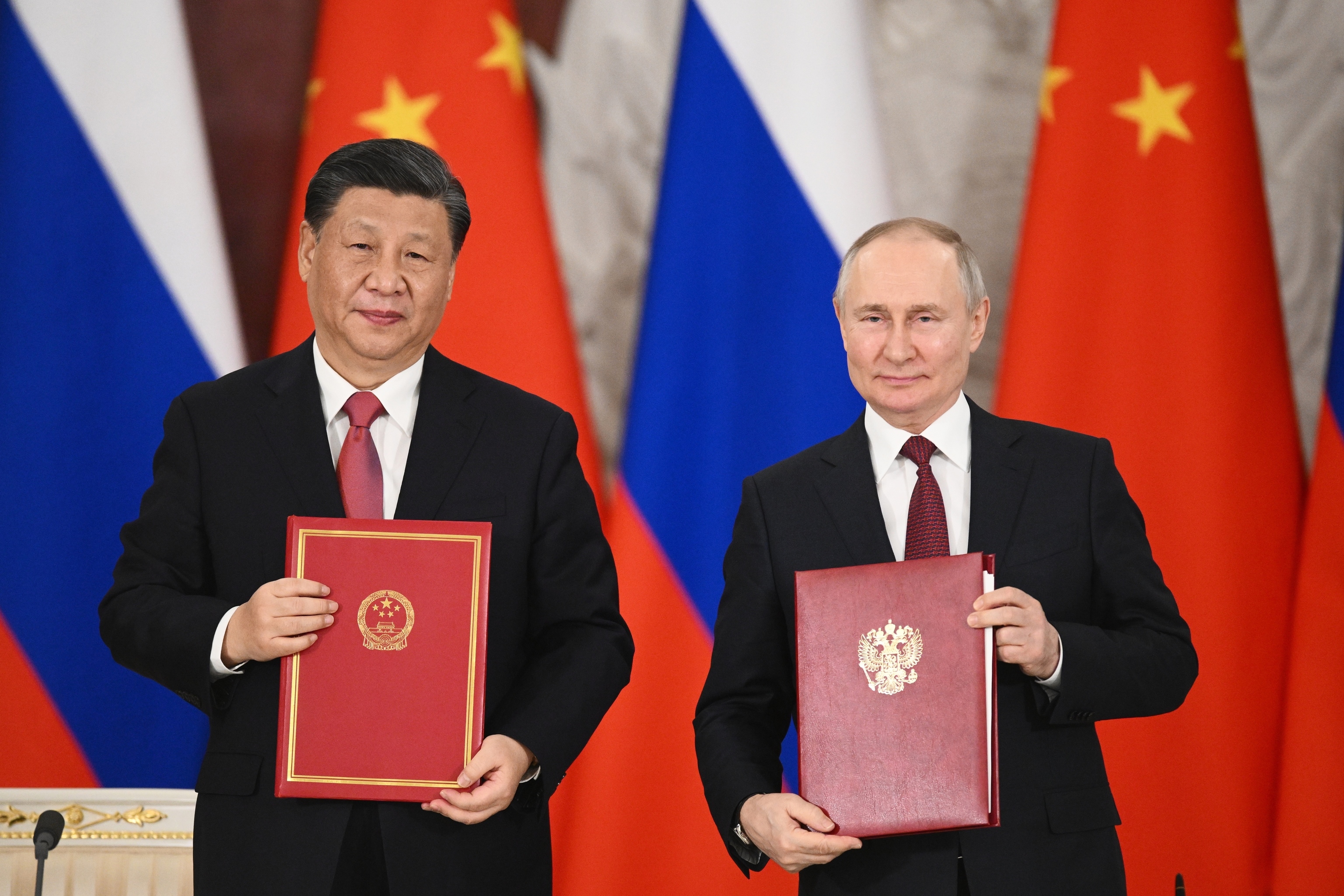 Russian President Vladimir Putin, right, and Chinese President Xi Jinping.