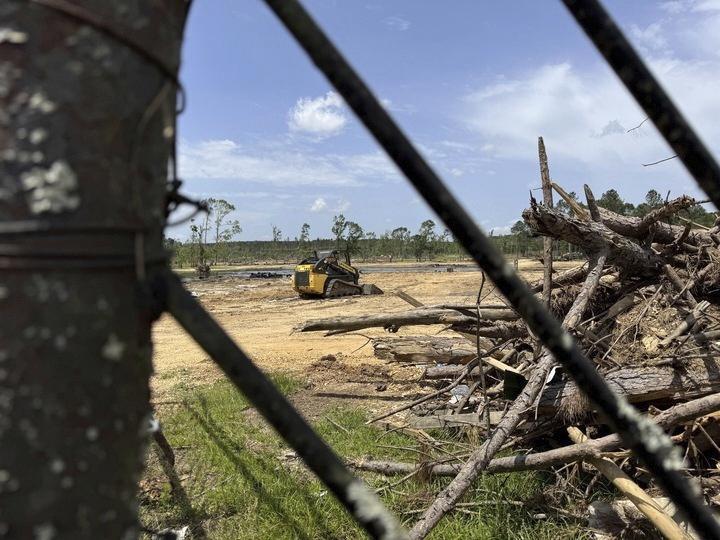 Debris still covers the ground at the Paradise Ranch RV Resort in the Tylertown,