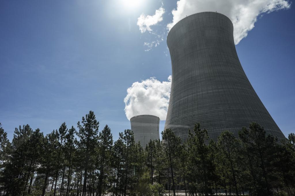 Cooling tower's three, left, and four are seen at the nuclear reactor facility