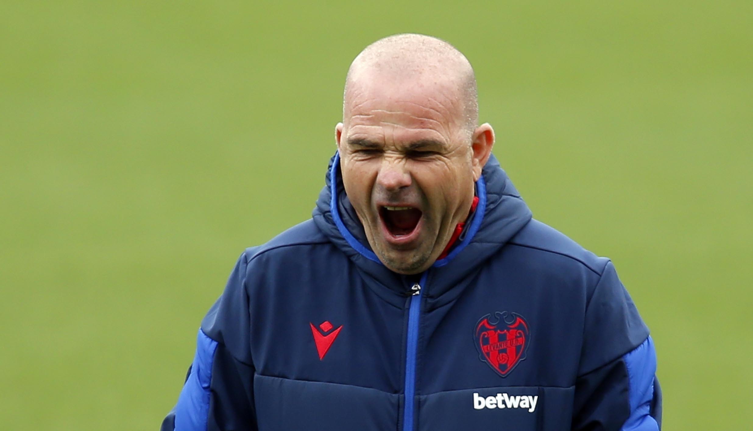 A man yawning.