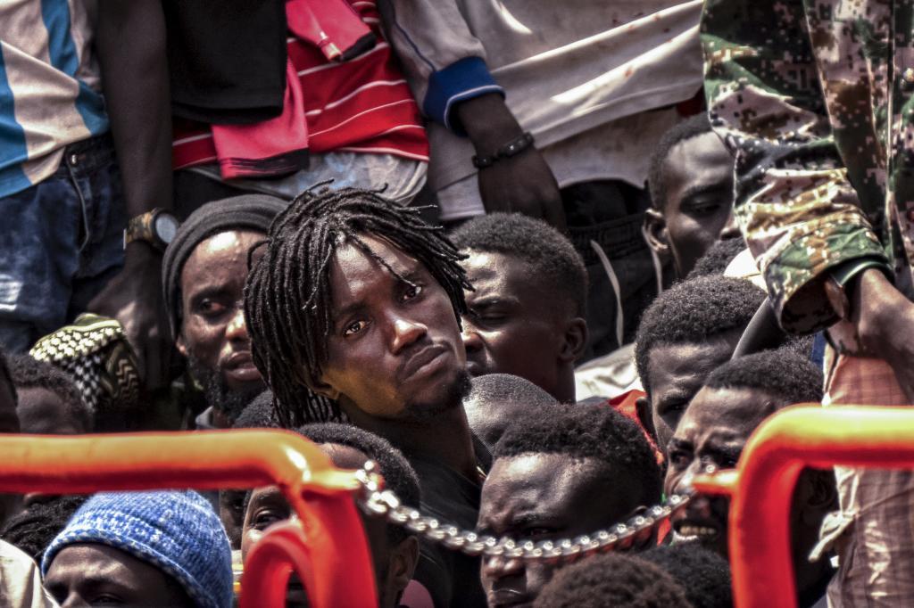 Migrants disembark at the port of on "La Estaca" in Valverde at the Canary island of El Hierro