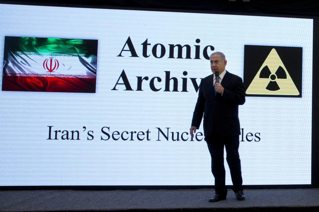Israeli Prime Minister Benjamin Netanyahu presents material on Iran's purported nuclear program in Tel Aviv
