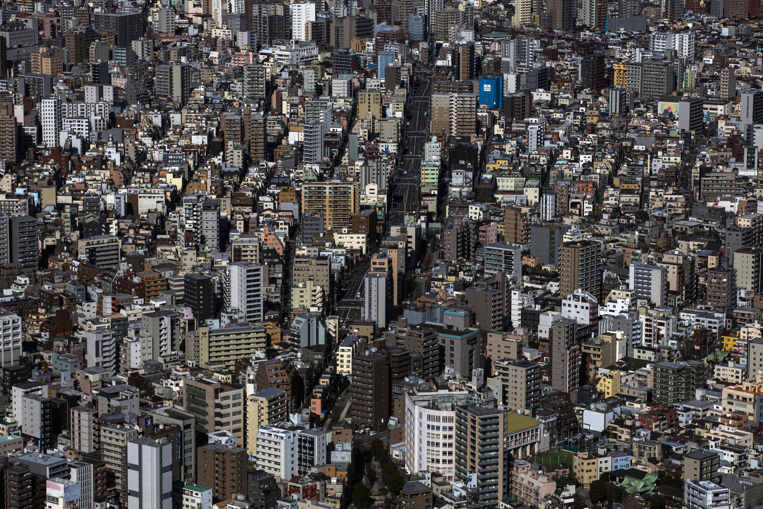 An aerial view of a densely packed neighborhood in Tokyo.
