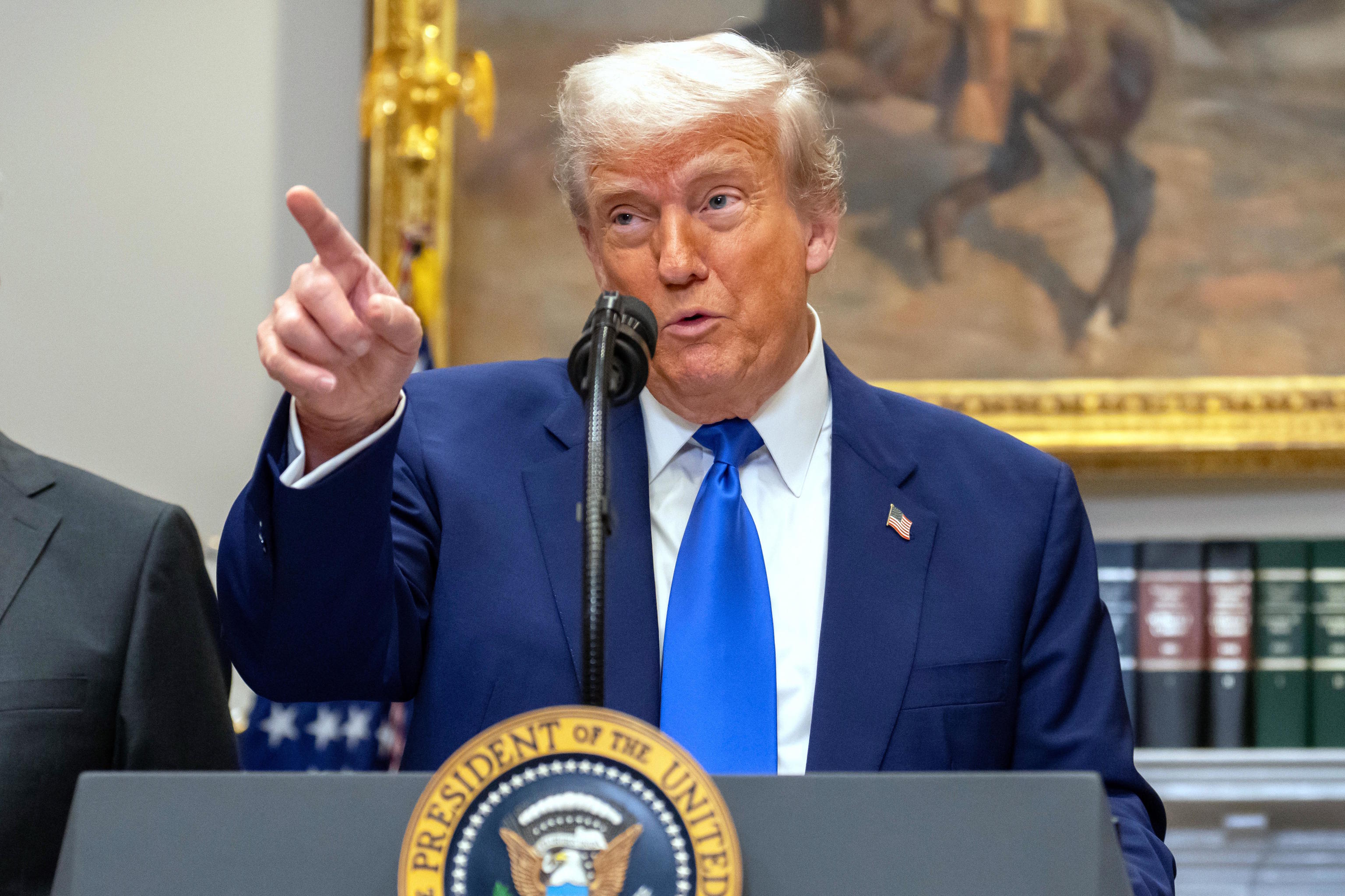 President Donald Trump gestures.