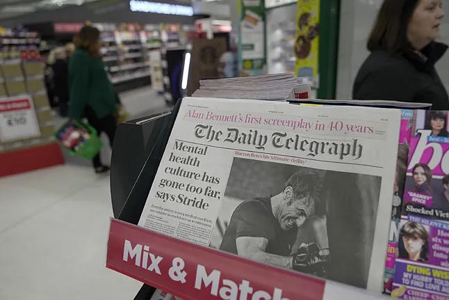A copy of The Daily Telegraph, on a supermarket counter.