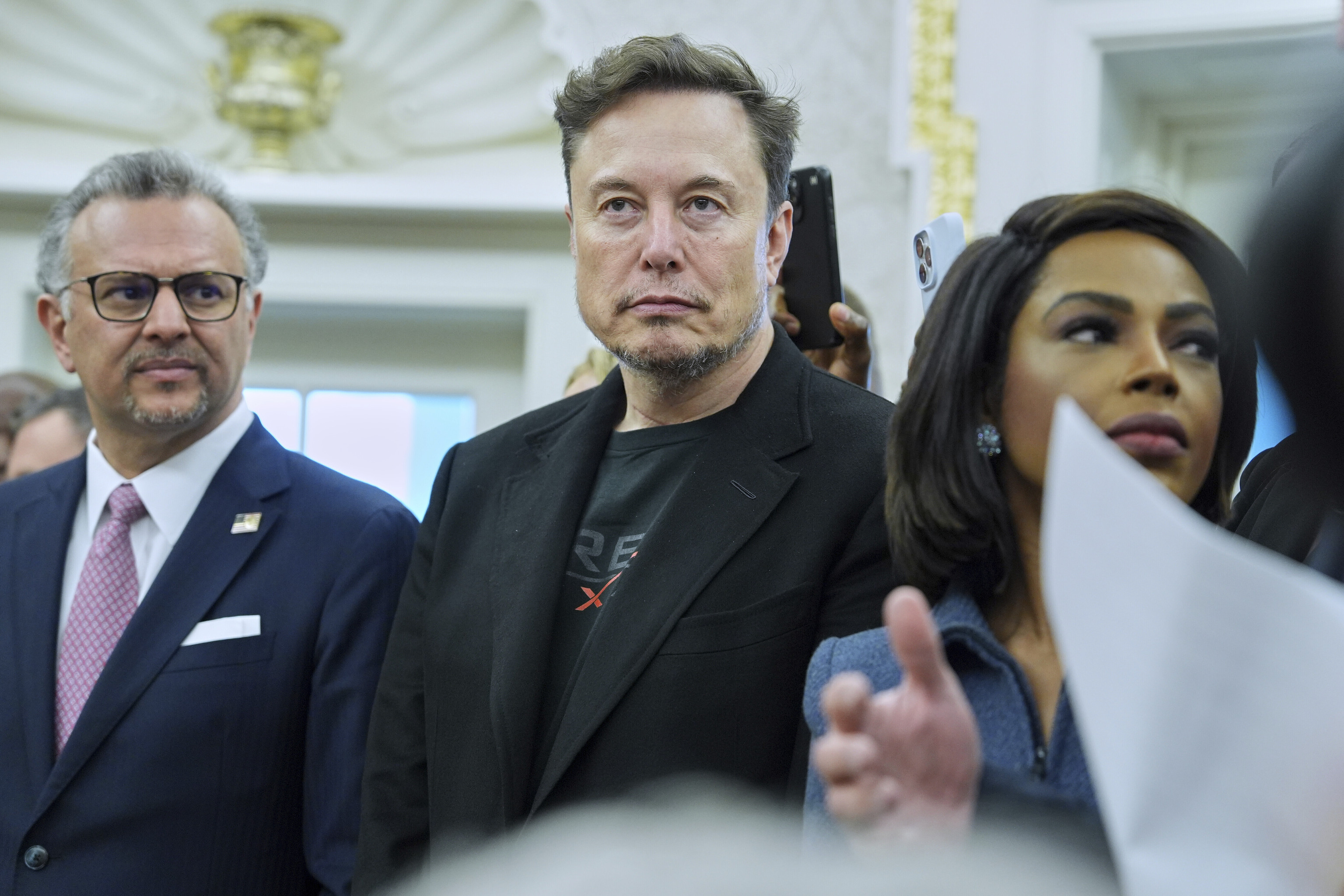 Elon Musk looks on as President Donald Trump meets South African President Cyril Ramaphosa.