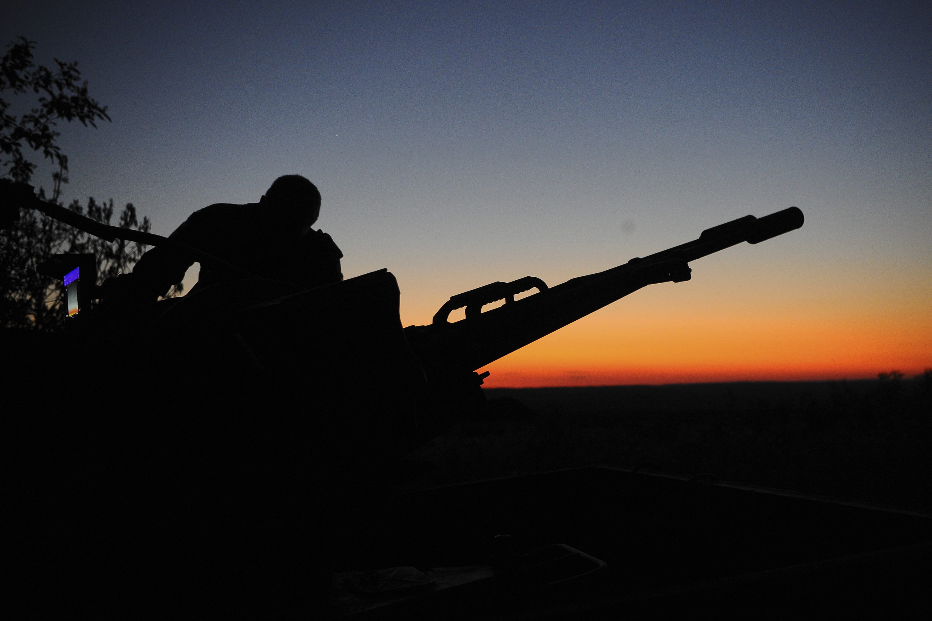 a soldier ready to fire against Russian drones attacks near Kharkiv, Ukraine.