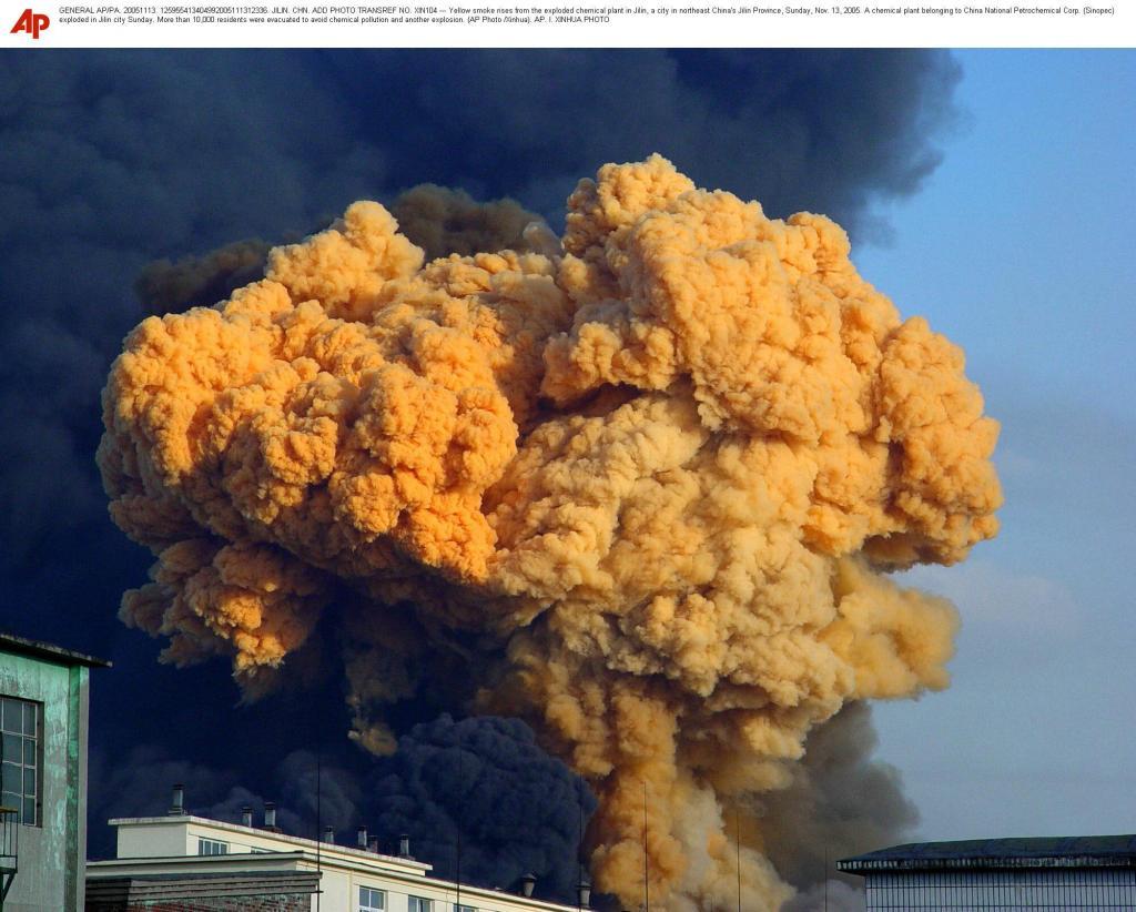 Yellow smoke rises from the exploded chemical plant in Jilin, a city in northeast China''s Jilin Province