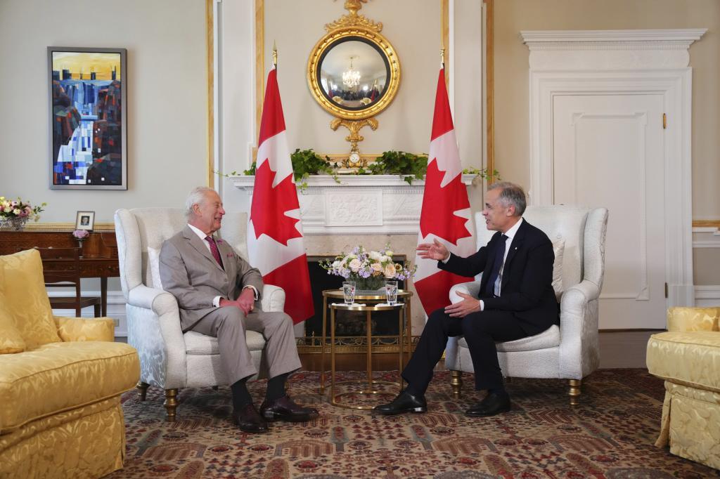Canada's Prime Minister Mark Carney, right, has an audience with Britain's King Charles at Rideau Hall in Ottawa,