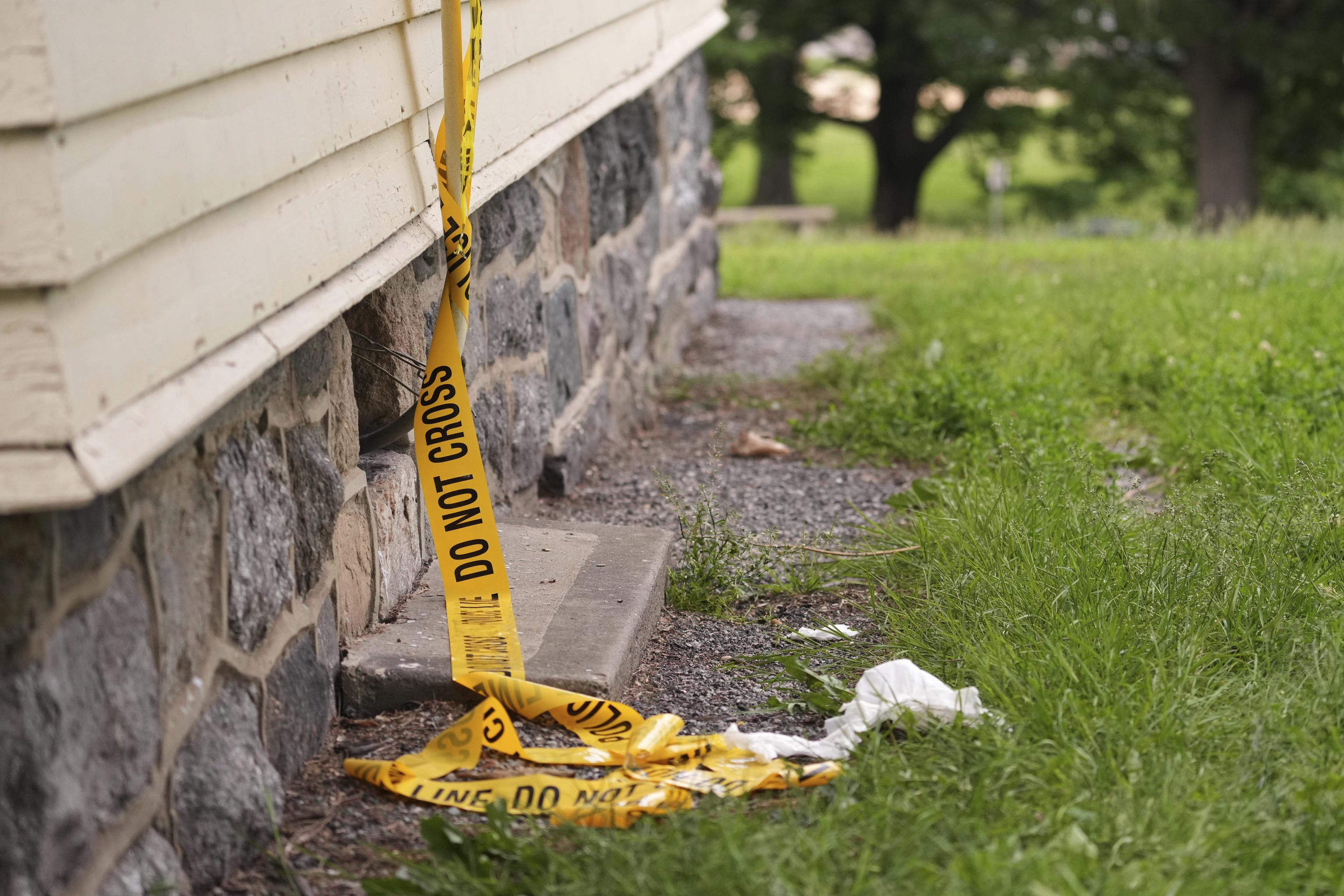 Police Line tape is seen in Fairmont Park the day after a shooting.