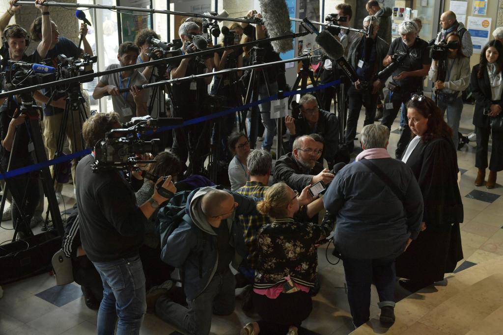 Reporters gather at a lawyer after Joel Le Scouarnec, a 74-year-old pedophile and former surgeon who raped hundreds of victims