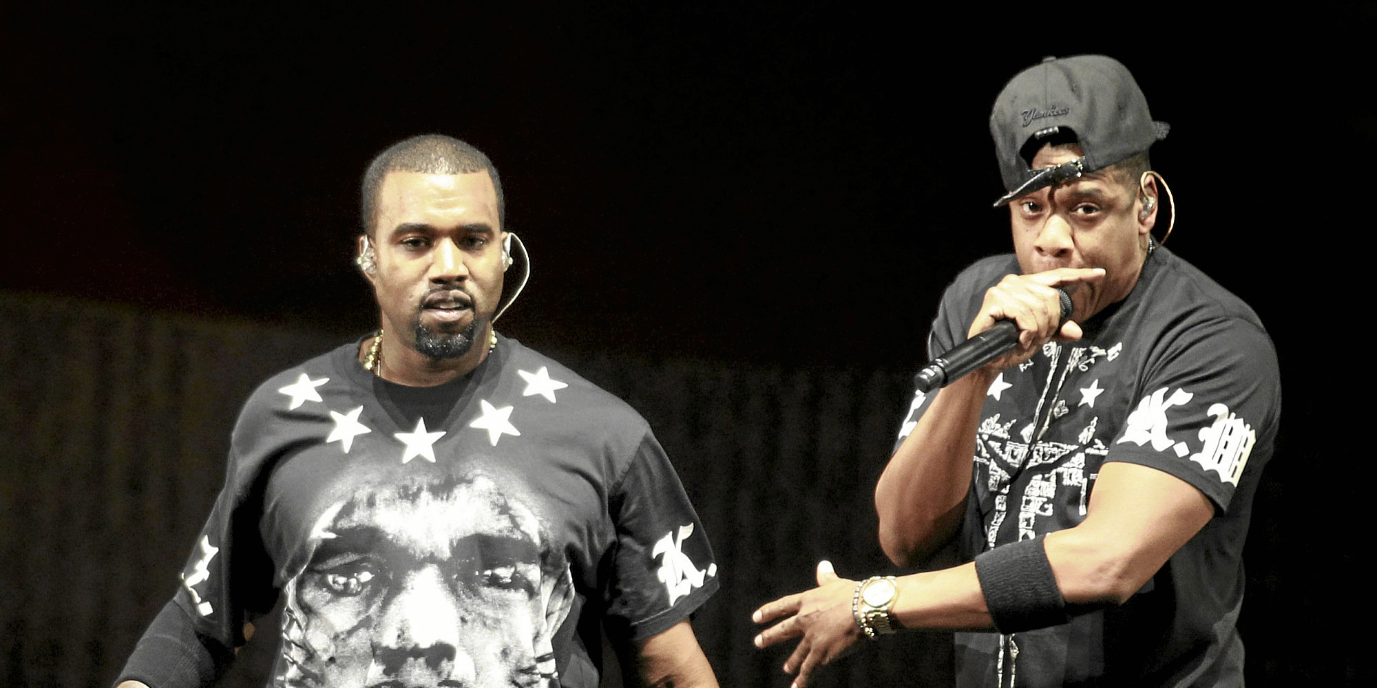 Kanye West, left, and Jay Z perform in concert.