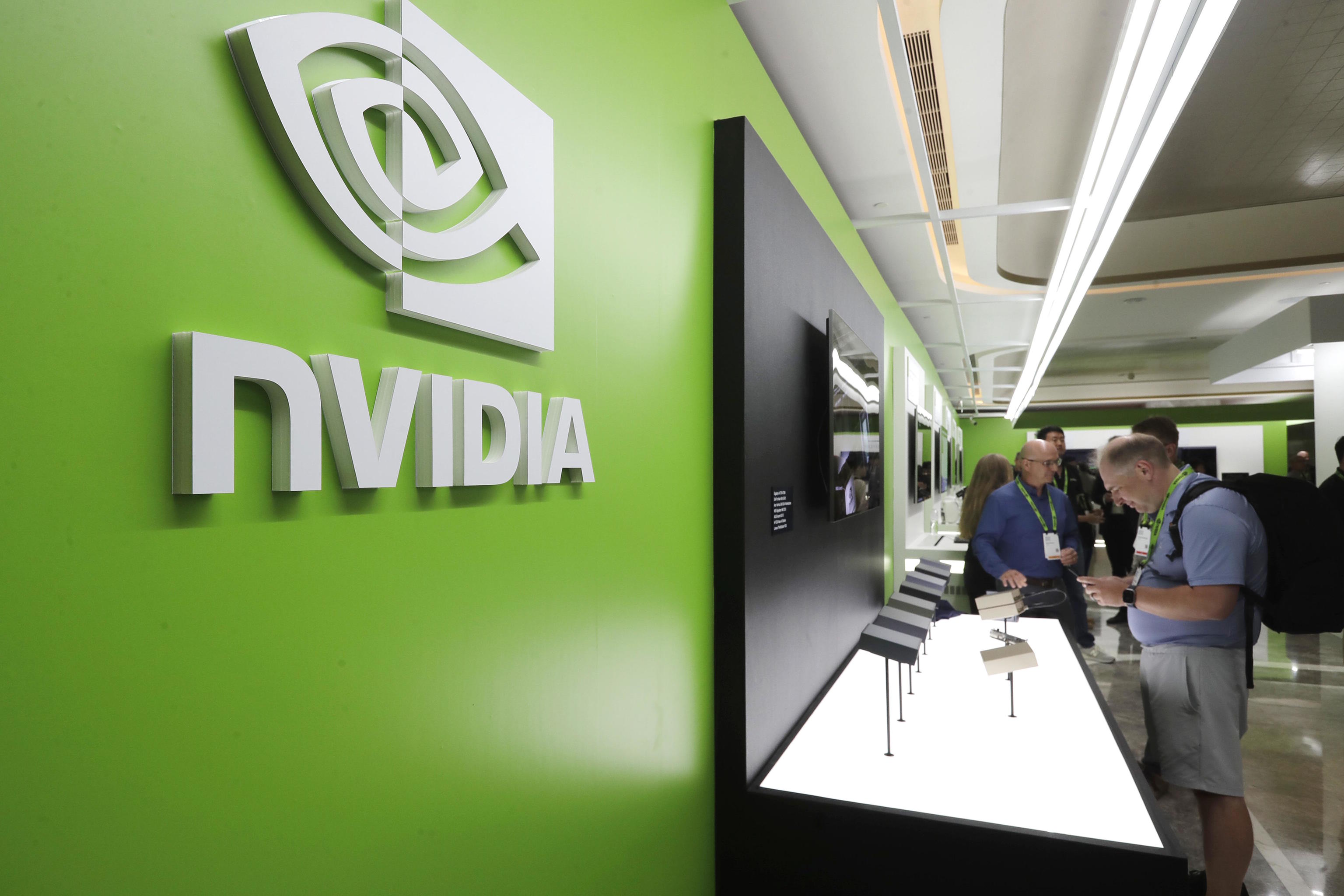 People take a look to Nvidia''s new products during the Computex 2025 exhibition in Taipei.