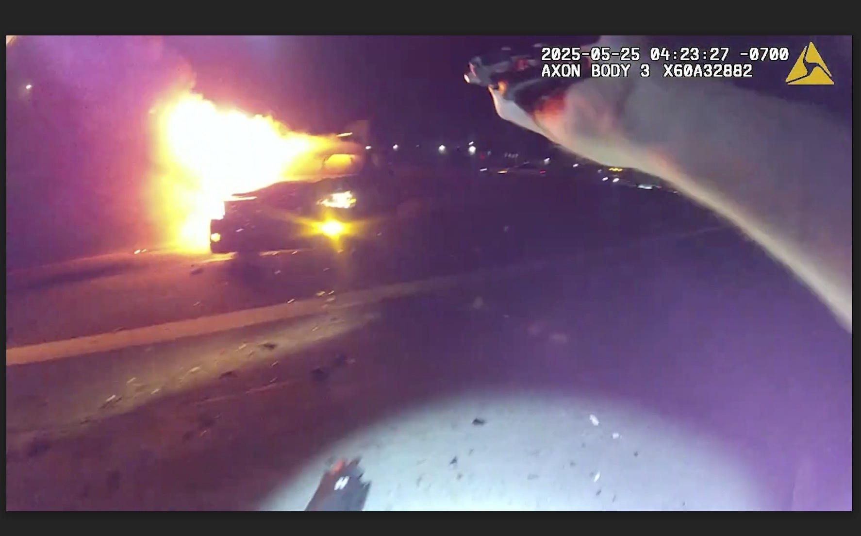 Officer Dakota Berry arrives at the scene of woman trapped inside a car fire.