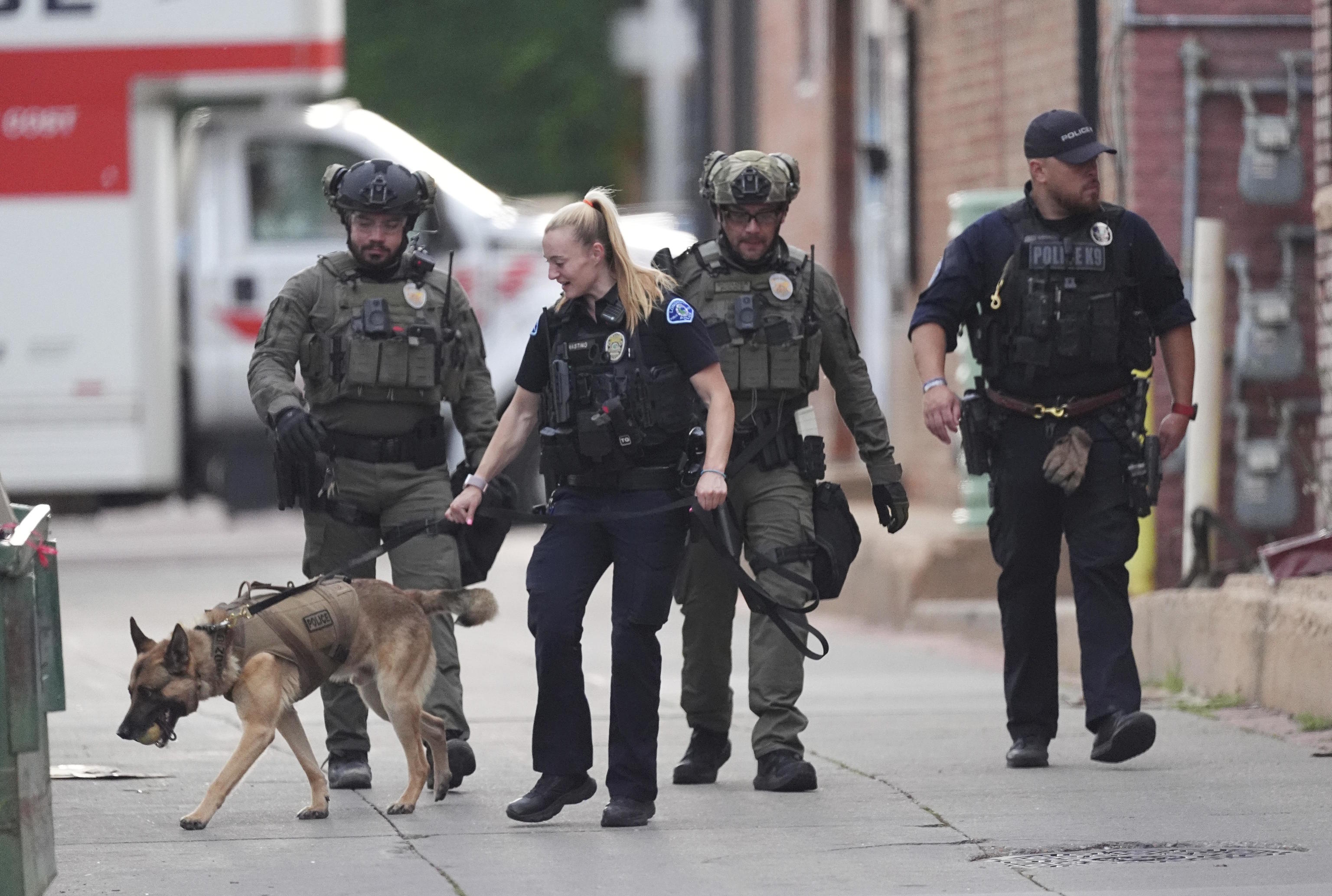 Police officers investigate after an attack in Boulder, Colorado.