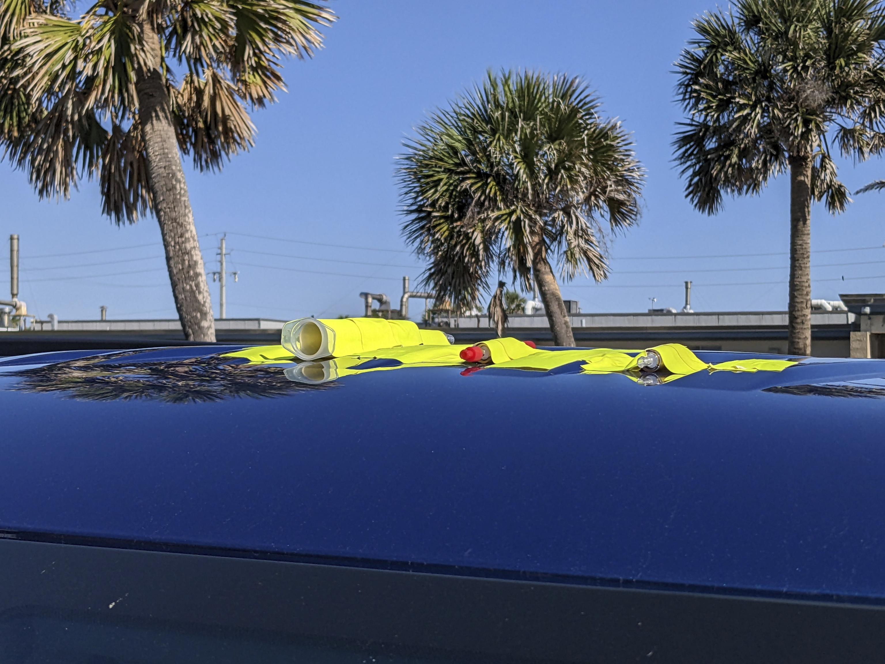 DNA analysis vials attached to the roof of a vehicle.