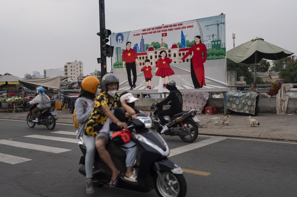 A billboard campaigning for each family to have two children