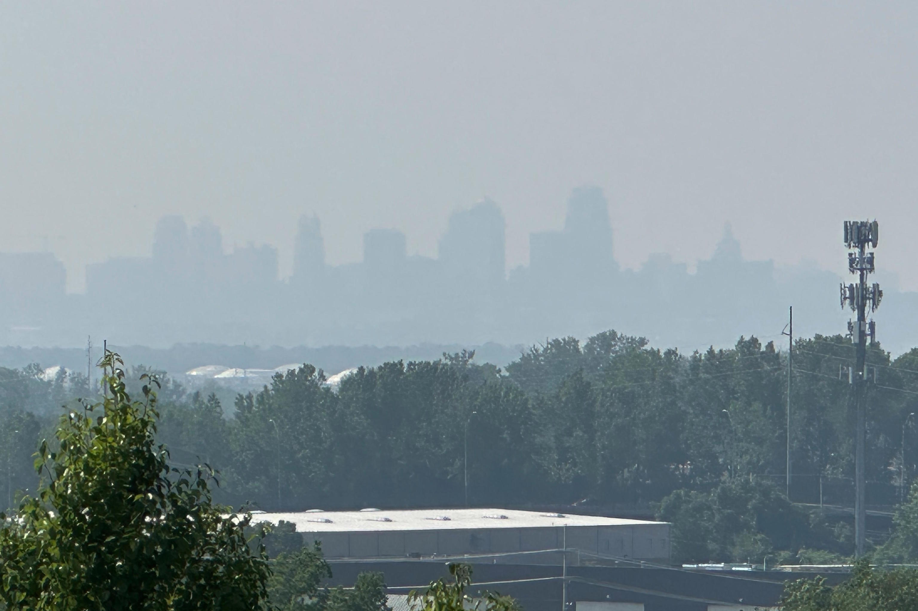 Smoke from Canadian wildfires can be seen partially obscuring the skyline of downtown Kansas City.