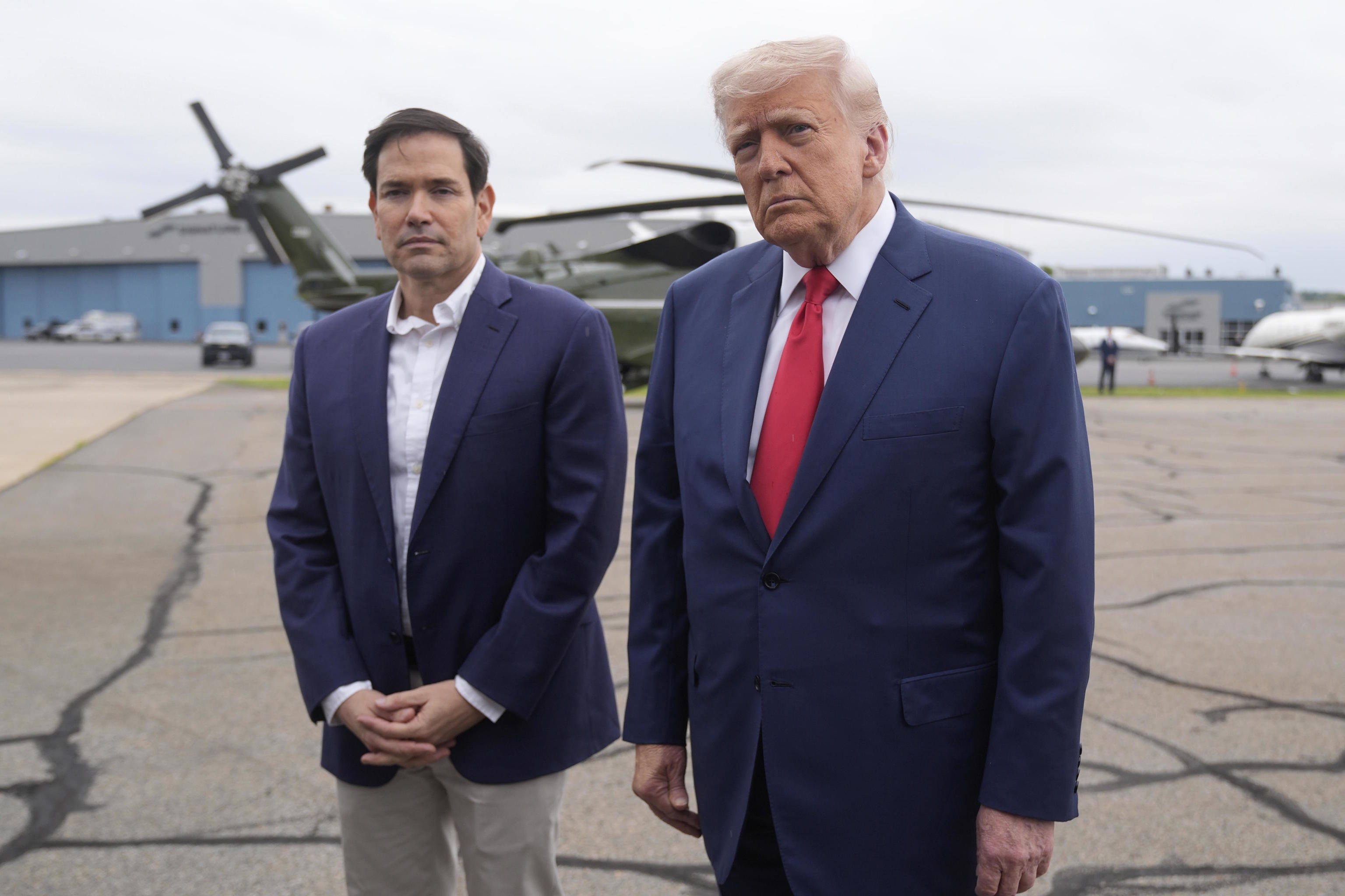 President Trump and Secretary of State Marco Rubio, speaks with reporters.
