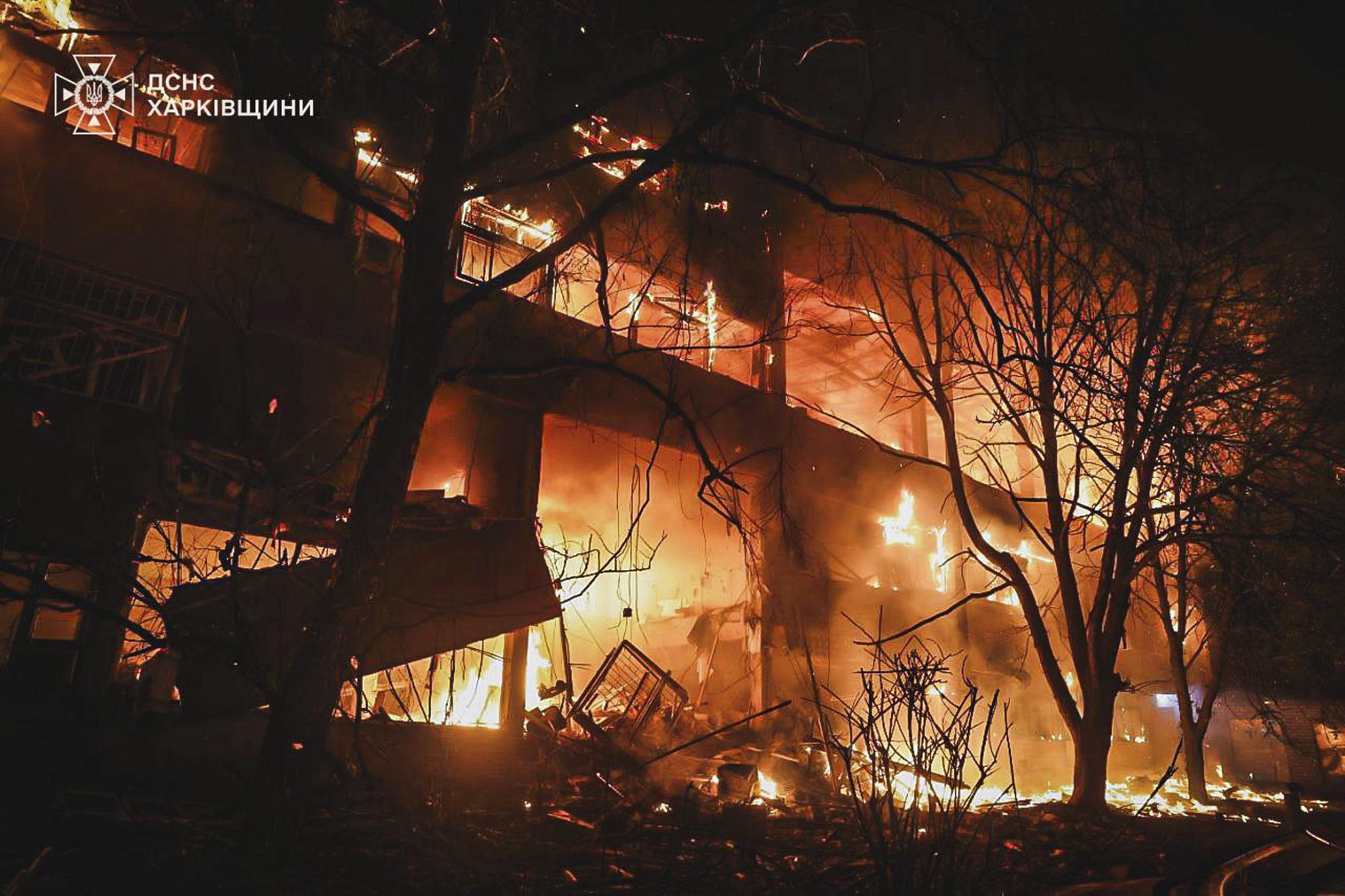 Building on fire after a drone attack in Kharkiv.