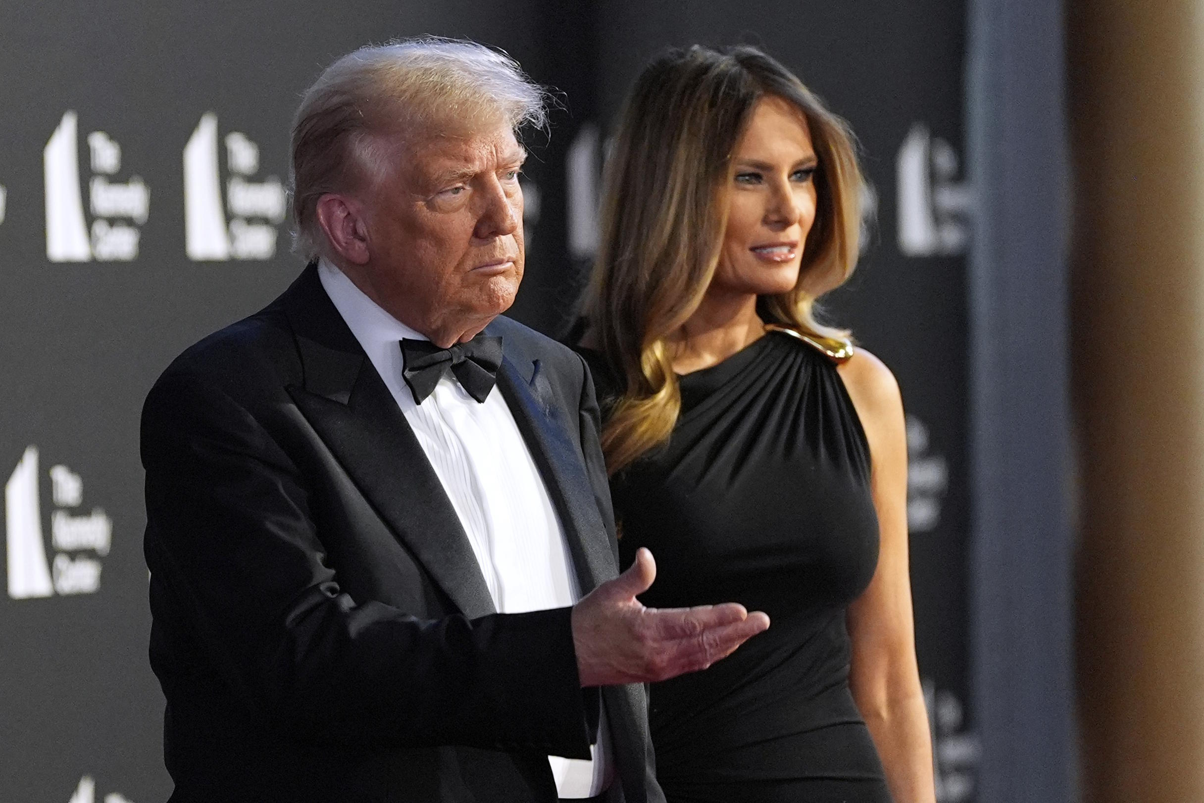 Trump and first lady Melania arrive to view opening night of "Les Miserables."