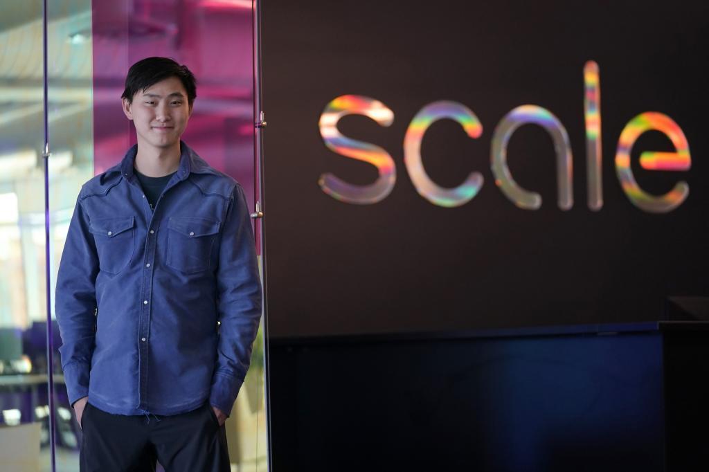 Scale AI founder and CEO Alexandr Wang poses for photos at the company's office in San Francisco,
