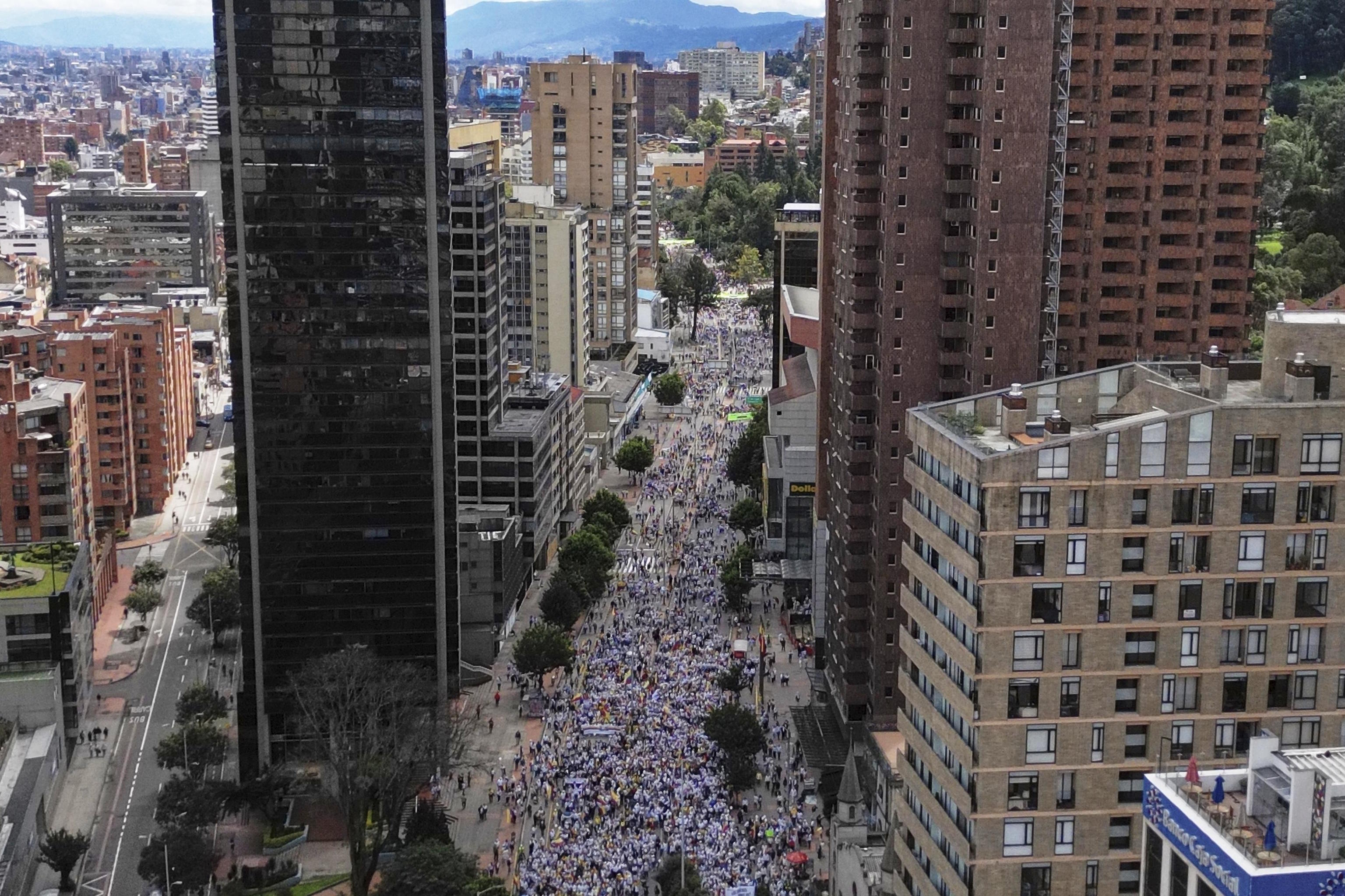 A crowd condemns the assassination attempt against Miguel Uribe in Bogot.