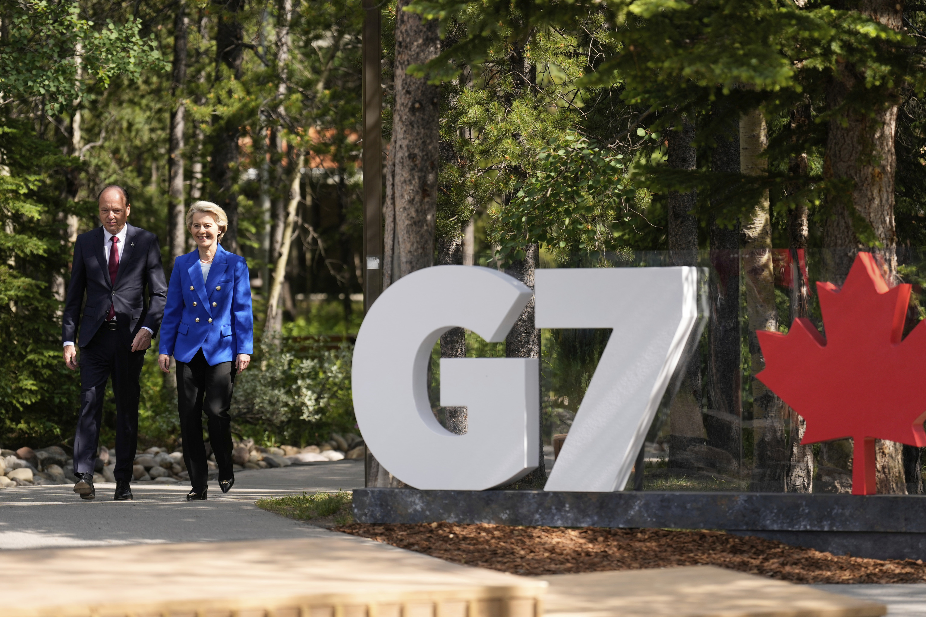 European Commission President Ursula von der Leyen, right, and her husband Heiko von der Leye arrive at the official welcome of the G7 Summit.
