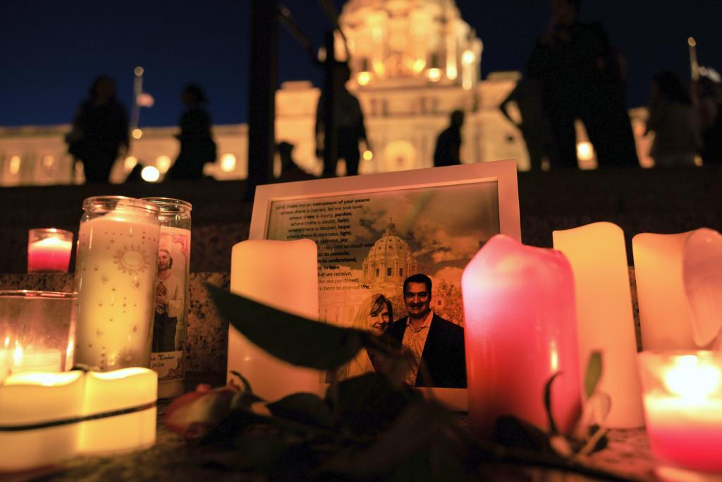 A candlelight vigil for former House Speaker Melissa Hortman and her husband Mark