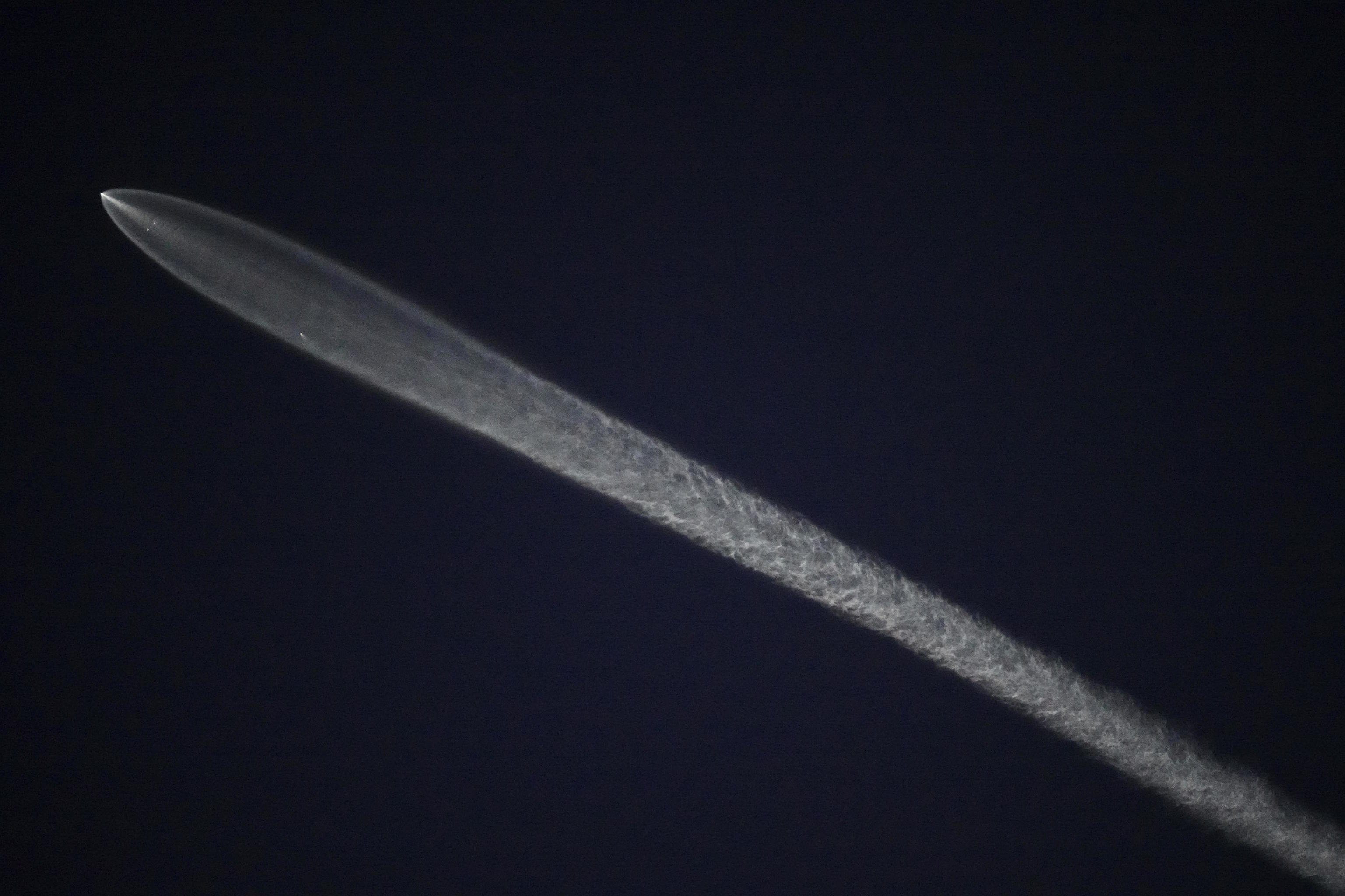 A SpaceX Falcon 9 rocket carrying 26 Starlink satellites launched from Calif.