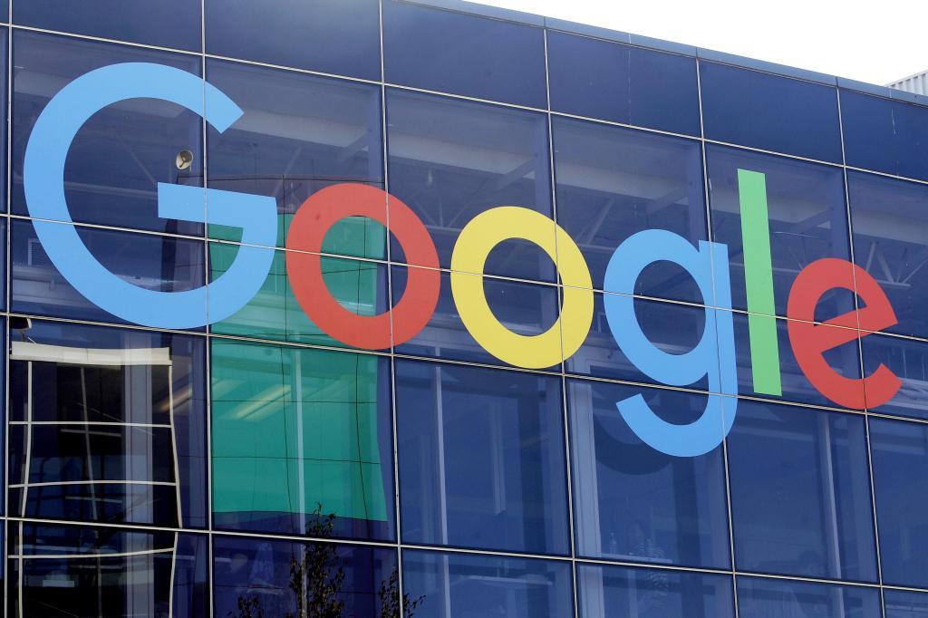 A sign is displayed on a Google building at their campus in Mountain View