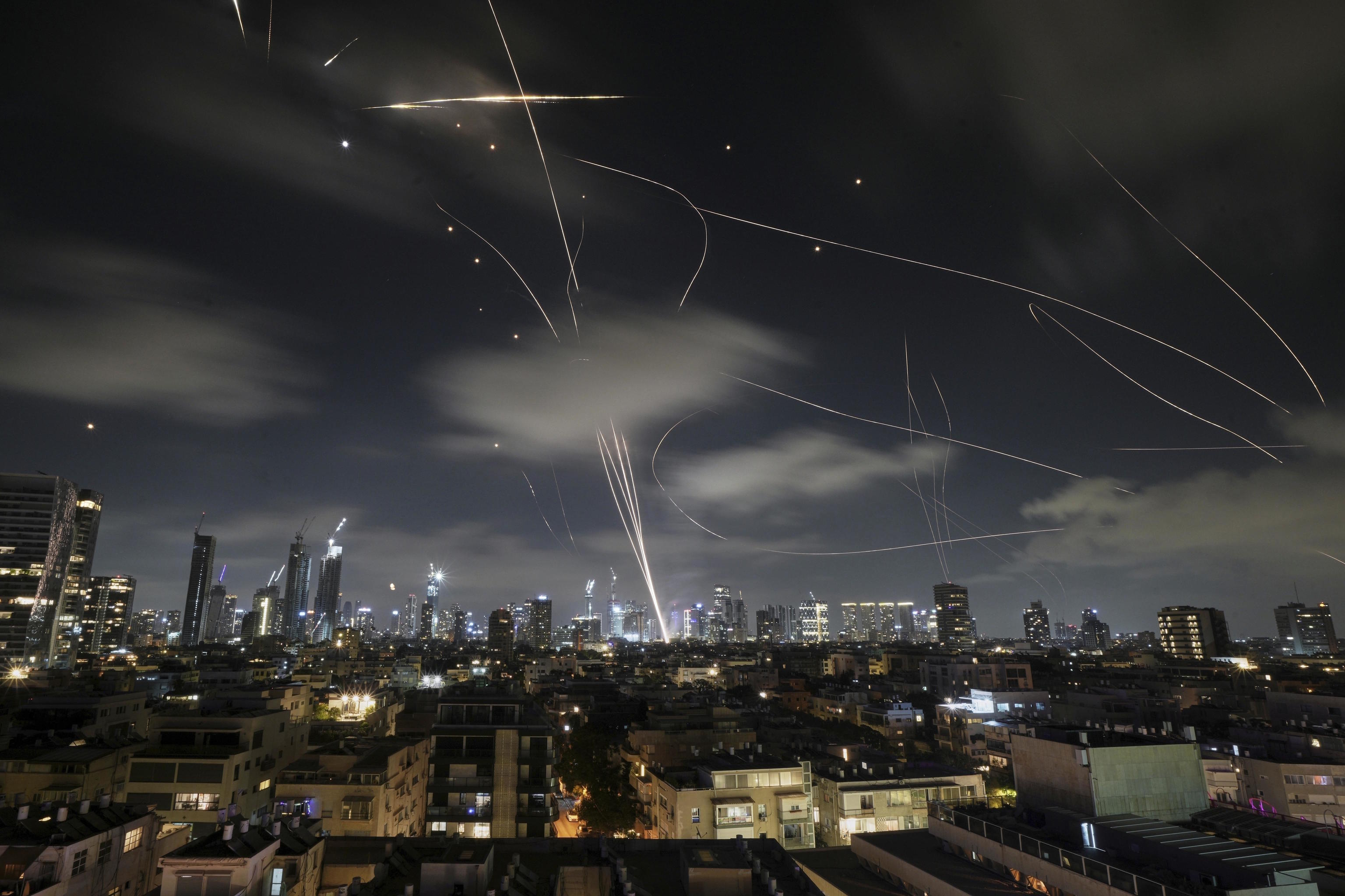 The Israeli Iron Dome air defense system fires to intercept missiles.