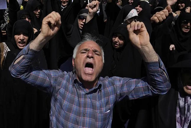 An Iranian man, during a protest in his country against Israel.